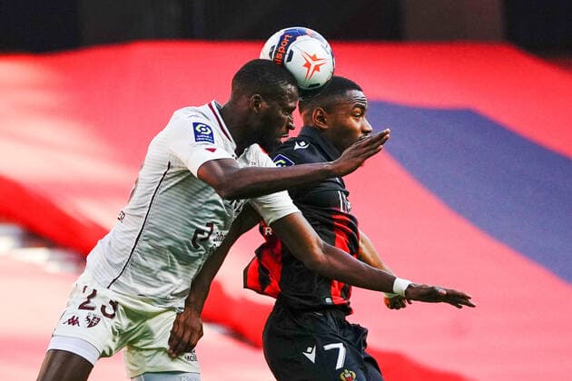 Boubakar Kouyate (FC Metz) - Myziane Maolida (OGC Nice) FOOTBALL : OGC Nice vs FC Metz - Ligue 1 Uber Eats - Nice - 21 02 2021 NorbertScanella PanoramiC 
