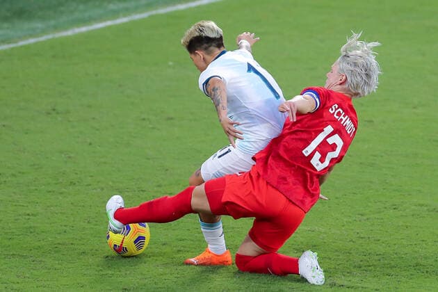 Fußball, Damen Länderspiel, SheBelieves Cup, Argentinien - Kanada February 21, 2021: Canada midfielder SOPHIE SCHMIDT (13) makes a sliding tackle against Argentina forward YAMILA RODRIGUEZ (11) during the SheBelieves Cup Argentina vs Canada match at Exploria Stadium in Orlando, Fl on February 21, 2021. - ZUMAk149 20210221_zsp_k149_054 Copyright: xCoryxKnowltonx