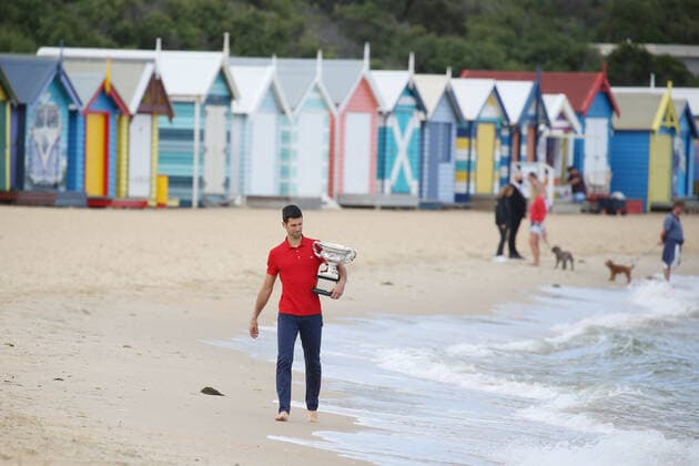 Novak Djokovic, SRB, presenting his trophy after 2021 Australian Open final in Melbourne on Brighton beach, 22 02 2021; -