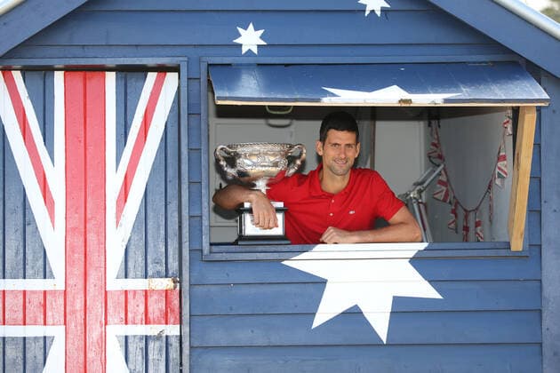 Novak Djokovic, SRB, presenting his trophy after 2021 Australian Open final in Melbourne on Brighton beach, 22 02 2021; -