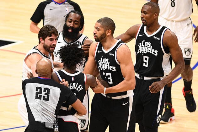 LOS ANGELES, CA - FEBRUARY 21: Brooklyn Nets Guard James Harden (13) and Los Angeles Clippers Guard Patrick Beverley (21) get in an argument after a foul during a NBA, Basketball Herren, USA game between the Brooklyn Nets and the Los Angeles Clippers on February 21, 2021 at STAPLES Center in Los Angeles, CA. The game was played without fans due to the COVID-19 pandemic. (Photo by Brian Rothmuller Icon Sportswire) NBA: FEB 21 Nets at Clippers Icon210221019