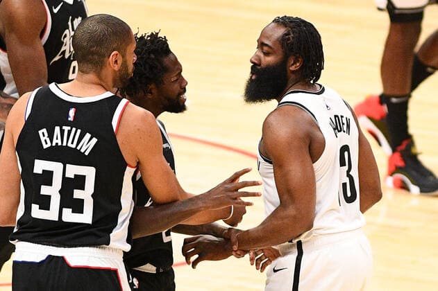 LOS ANGELES, CA - FEBRUARY 21: Brooklyn Nets Guard James Harden (13) and Los Angeles Clippers Guard Patrick Beverley (21) get in an argument after a foul during a NBA, Basketball Herren, USA game between the Brooklyn Nets and the Los Angeles Clippers on February 21, 2021 at STAPLES Center in Los Angeles, CA. The game was played without fans due to the COVID-19 pandemic. (Photo by Brian Rothmuller Icon Sportswire) NBA: FEB 21 Nets at Clippers Icon210221020