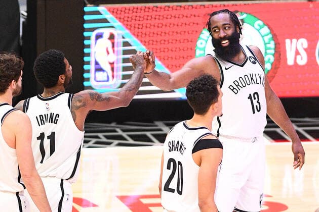 LOS ANGELES, CA - FEBRUARY 21: Brooklyn Nets Guard James Harden (13) and Guard Kyrie Irving (11) give high fives in the final minute of a NBA, Basketball Herren, USA game between the Brooklyn Nets and the Los Angeles Clippers on February 21, 2021 at STAPLES Center in Los Angeles, CA. The game was played without fans due to the COVID-19 pandemic. (Photo by Brian Rothmuller Icon Sportswire) NBA: FEB 21 Nets at Clippers Icon210221035