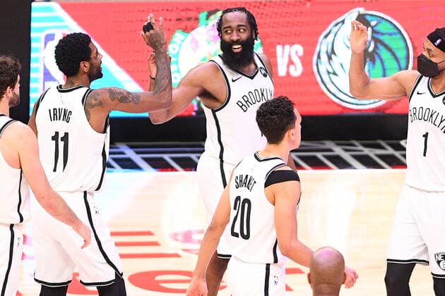 LOS ANGELES, CA - FEBRUARY 21: Brooklyn Nets Guard James Harden (13) and Guard Kyrie Irving give high fives in the final minute of a NBA, Basketball Herren, USA game between the Brooklyn Nets and the Los Angeles Clippers on February 21, 2021 at STAPLES Center in Los Angeles, CA. The game was played without fans due to the COVID-19 pandemic. (Photo by Brian Rothmuller Icon Sportswire) NBA: FEB 21 Nets at Clippers Icon210221036