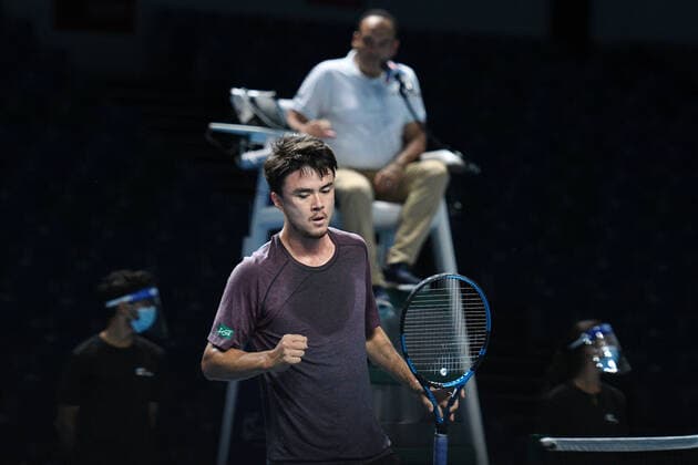 (210222) -- SINGAPORE, Feb. 22, 2021 -- Japan s Daniel Taro reacts during the men s singles first round match between Japan s Daniel Taro and India s Ramkumar Ramanathan at the Singapore Tennis Open in Singapore, Feb. 22, 2021. (Photo by Xinhua) (SP)SINGAPORE-TENNIS-SINGAPORE OPEN-MEN S SINGLES ThenxChihxWey 