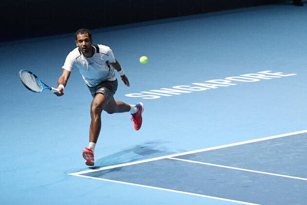 (210222) -- SINGAPORE, Feb. 22, 2021 -- India s Ramkumar Ramanathan returns a ball during the men s singles first round match between Japan s Daniel Taro and India s Ramkumar Ramanathan at the Singapore Tennis Open in Singapore, Feb. 22, 2021. (Photo by Xinhua) (SP)SINGAPORE-TENNIS-SINGAPORE OPEN-MEN S SINGLES ThenxChihxWey 