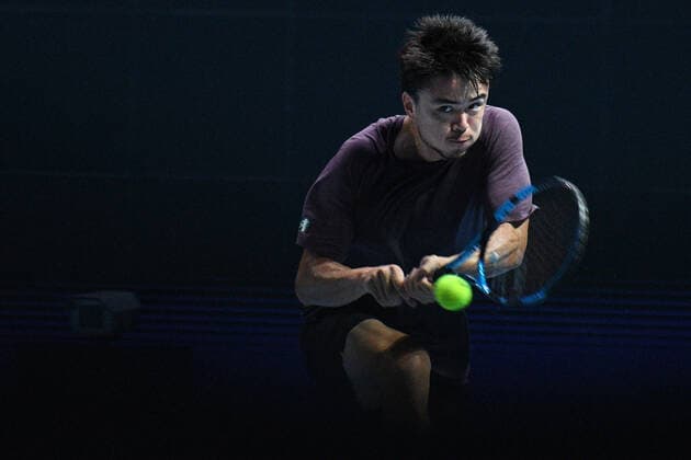 (210222) -- SINGAPORE, Feb. 22, 2021 -- Japan s Daniel Taro returns a ball during the men s singles first round match between Japan s Daniel Taro and India s Ramkumar Ramanathan at the Singapore Tennis Open in Singapore, Feb. 22, 2021. (Photo by Xinhua) (SP)SINGAPORE-TENNIS-SINGAPORE OPEN-MEN S SINGLES ThenxChihxWey 