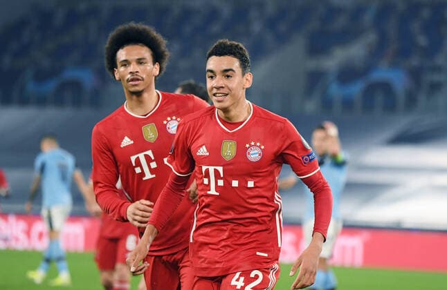 Bilder des Jahres 2021, Sport 02 Februar Sport Themen der Woche KW08 Sport Bilder des Tages FUSSBALL CHAMPIONS LEAGUE SAISON 2020 2021 Achtelfinale Hinspiel 23.02.2021 Lazio Rom - FC Bayern Muenchen JUBEL FC Bayern Muenchen; Torschuetze zum 0-2 Jamal Musiala (re), damit ist er der juengste CHL Torschuetze des FC Bayern, Leroy Sane (li hinten) *** FOOTBALL CHAMPIONS LEAGUE SEASON 2020 2021 Round of 16 First leg 23 02 2021 Lazio Roma FC Bayern Muenchen JUBEL FC Bayern Muenchen Goalscorer to 0 2 Jamal Musiala re , making him FC Bayerns youngest CHL goalscorer, Leroy Sane purl behind