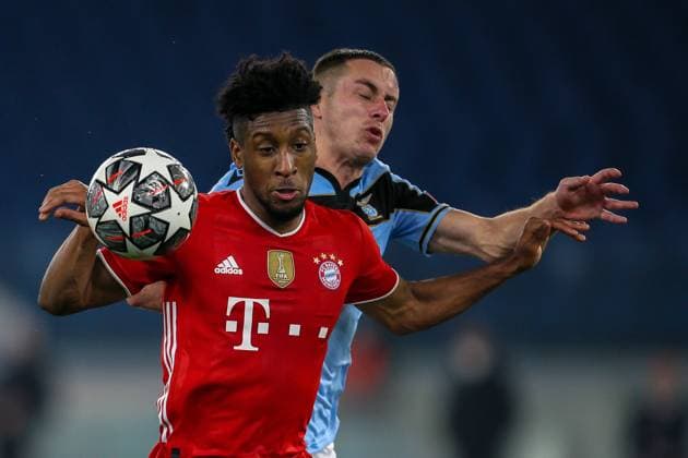 UEFA Champions League ( SS Lazio VS Bayern Muenchen - 2021 02 23 ) ROME, ITALY, FEB 23: Kingsley Coman of Bayern München is challenged by Adam Marusic of SS Lazio during the UEFA Champions League Round of 16 match between Lazio Roma and Bayern München at Olimpico Stadium on February 23, 2021 in Rome, Italy. Bayern München won the match 4-1 . Rome Olympic Stadium Italy 6197_232711 Copyright: xGiampieroxSposito PentaxPressx