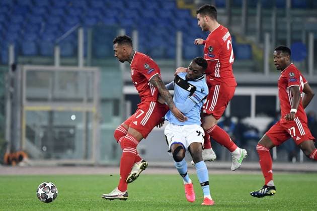 Jerome Boateng of FC Bayern Munchen , Jean Daniel Akpa Akpro of SS Lazio and Lucas Hernandez of FC Bayern Munchen compete for the ball during the Champions League round of 16 football match between SS Lazio and Bayern Munchen at stadio Olimpico in Rome (Italy), February, 23th, 2021. Photo Andrea Staccioli Insidefoto andreaxstaccioli