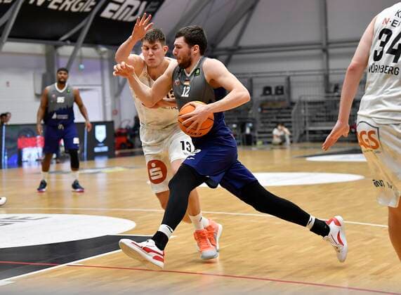 24.02.2021 - Basketball - Saison 2020 2021 - 2. Bundesliga Pro-A - 10. Spieltag: Nürnberg Falcons Basketball Club NBC - Uni Baskets Paderborn - - Jonathan Maier (13, Nürnberg Falcons BC NBC ) Robert Drijencic (12, Uni Baskets Paderborn )