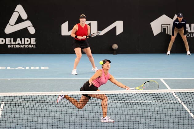 ADELAIDE, AUSTRALIA - FEBRUARY 26: Alexa Guarachi of Chile and Desirae Krawczyk of United States plays a shot against Kaitlyn Christian and Sabrina Santamaria of United States during their doubles match on day five of the Adelaide International tennis tournament at Memorial Drive on February 26, 2021 in Adelaide, Australia. (Photo by Peter Mundy Speed Media Icon Sportswire) TENNIS: FEB 26 - Adelaide International Icon210226020