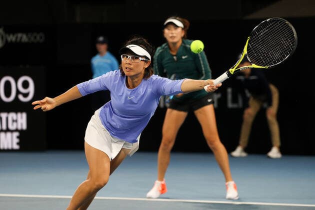 ADELAIDE, AUSTRALIA - FEBRUARY 26: Y Xu and Z Yang of China plays a shot against Hayley Carter of United States and Luisa Stefani of Brazil during their doubles match on day five of the Adelaide International tennis tournament at Memorial Drive on February 26, 2021 in Adelaide, Australia. (Photo by Peter Mundy Speed Media Icon Sportswire) TENNIS: FEB 26 - Adelaide International Icon210226268