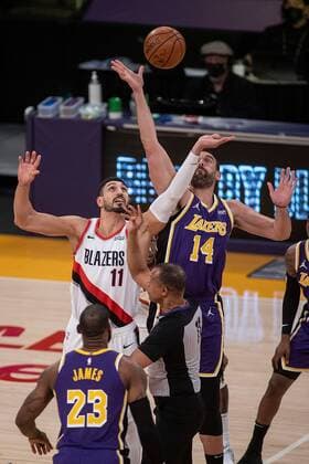 Marc Gasol 14 of the Los Angeles Lakers and Enes Kanter 11 of the Portland Trailblazers start their regular season NBA, Basketball Herren, USA game at the Staples Center in Los Angeles, California, USA, Friday February 26, 2021. Lakers vs Trailblazers !ACHTUNG: NUR REDAKTIONELLE NUTZUNG!  Copyright: xJAVIERxROJASx AME8486 20210227-637500026168683458