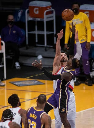 February 26, 2021, Los Angeles, California, USA: LeBron James 23 of the Los Angeles Lakers tries to put a shot over Enes Kanter 11 of the Portland Trailblazers during their regular season NBA, Basketball Herren, USA game on Friday February 26, 2021 at the Staples Center in Los Angeles, California. Lakers defeat Trailblazers, 102-93. PI Los Angeles USA - ZUMAp124 20210226_zaa_p124_016 Copyright: xJAVIERxROJASx