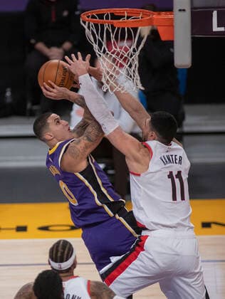 February 26, 2021, Los Angeles, California, USA: Kyle Kuzma 0 of the Los Angeles Lakers is fouled by Enes Kanter 11 of the Portland Trailblazers during their regular season NBA, Basketball Herren, USA game on Friday February 26, 2021 at the Staples Center in Los Angeles, California. Lakers defeat Trailblazers, 102-93. PI Los Angeles USA - ZUMAp124 20210226_zaa_p124_039 Copyright: xJAVIERxROJASx