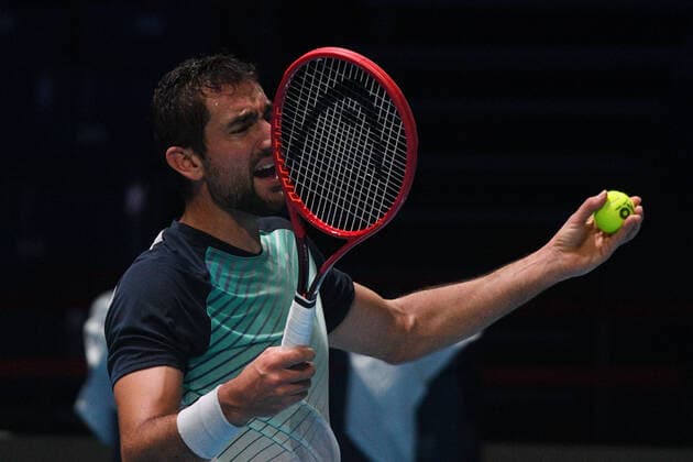 (210227) -- SINGAPORE Feb. 27, 2021 -- Marin Cilic reacts during the men s singles semi-final match between Croatia s Marin Cilic and Australia s Alexei Popyrin at the Singapore Tennis Open tournament in Singapore on Feb. 27, 2021. (Photo by Xinhua) (SP)SINGAPORE-TENNIS-SINGAPORE OPEN-MEN S SINGLES ThenxChihxWey 