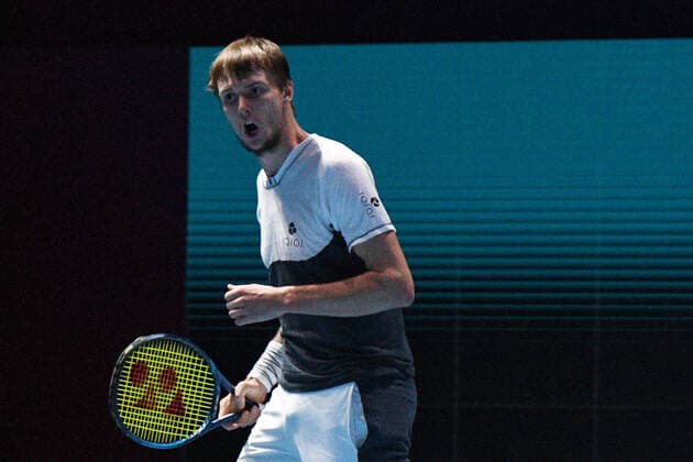 (210228) -- SINGAPORE, Feb. 28, 2021 -- Alexander Bublik of Kazakhstan reacts during the men s singles final against Alexei Popyrin of Australia at the Singapore Tennis Open tournament in Singapore on Feb. 28, 2021. (Photo by Xinhua) (SP)SINGAPORE-TENNIS-SINGAPORE OPEN-MEN S SINGLES ThenxChihxWey 