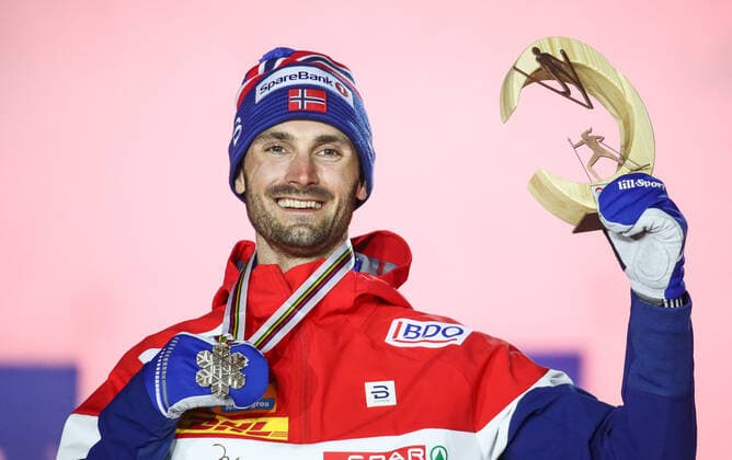 OBERSTDORF, GERMANY - FEBRUARY 28, 2021: Bronze medalist Hans Christer Holund of Norway poses for a photograph during an award ceremony for the men s 30km skiathlon event at the 2021 FIS Nordic World Ski Championships. Sergei Bobylev TASS  TS0F821A