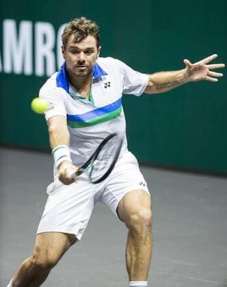 ROTTERDAM - Stan Wawrinka (SUI) in action against Karen Khachanov (RUS) on the second day of the ABN AMRO World Tennis Tournament. The ATP, Tennis Herren tournament in Ahoy takes place without an audience due to the corona pandemic. ANP KOEN SUYK xVIxANPxSportx xxANPxIVx