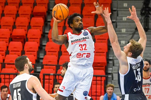 L-R David Kravish of Bamberg, Retin Obasohan of Nymburk and Christian Sengfelder of Bamberg in action during the Men s Basketball Champions League 1st round group L match ERA Nymburk vs Brose Bamberg in Nymburk, Czech Republic, March 2nd, 2021. (CTKxPhoto VitxSimanek) CTKPhotoP202103020964501  VIS 002