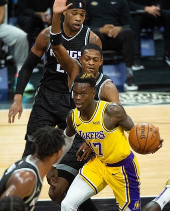 March 3, 2021, Sacramento, CA, USA: Los Angeles Lakers guard Dennis Schroder (17) drives past Sacramento Kings guard De Aaron Fox (5) in the first quarter during a game at Golden 1 Center on Wednesday, Mar. 3, 2021 in Sacramento. Sacramento USA - ZUMAj89_ 20210303_zaf_j89_001 Copyright: xPaulxKitagakixJr.x
