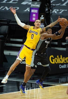 March 3, 2021, Sacramento, CA, USA: Sacramento Kings guard De Aaron Fox (5) steals a pass to Los Angeles Lakers forward Kyle Kuzma (0) in the fourth quarter during a game at Golden 1 Center on Wednesday, Mar. 3, 2021 in Sacramento. The Kings win 123-121. Sacramento USA - ZUMAj89_ 20210303_zaf_j89_020 Copyright: xPaulxKitagakixJr.x