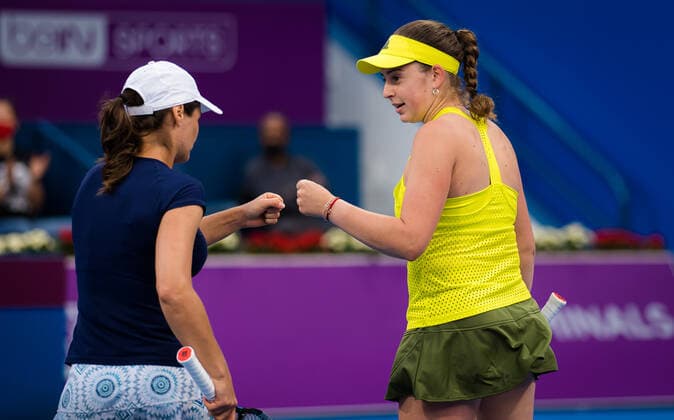 March 5, 2021, DOHA, QATAR: Jelena Ostapenko of Latvia & Monica Niculescu of Romania in action during the doubles final of the 2021 Qatar Total Open WTA, Tennis Damen 500 tournament DOHA QATAR - ZUMAa181 20210305_zaa_a181_242 Copyright: xRobxPrangex