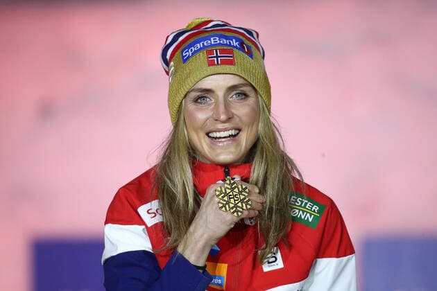 BAVARIA, GERMANY â€“ MARCH 6, 2021: Gold medal winner Therese Johaug smiles during the medal ceremony for the womenâ€™s 30 km mass start classical cross-country competition at the 2021 FIS Nordic World Ski Championships in Oberstdorf, a resort in the Allgau Alps of Bavaria, Germany. Sergei Bobylev TASS  TS0F8BB7