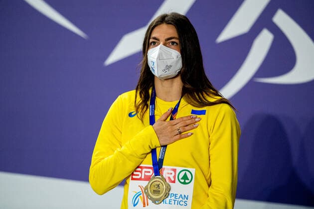 210307 Maryna Bekh-Romanchuk of Ukraine on the podium with her gold medal after the women s long jump final during the European Athletics Indoor Championships on March 7, 2021 in Torun. Photo: Vegard Wivestad Grott BILDBYRAN kod VG VG0096 bbeng european athletics indoor championships 2021 friidrotts-em 2021 friidretts-em 2021 inomhus-em innendors-em em friidrett friidrott athletics dam long jump lengde längdhopp *** 210307 Maryna Bekh Romanchuk of Ukraine on the podium with her gold medal after the women s long jump final during the European Athletics Indoor Championships on March 7, 2021 in Torun Photo Vegard Wivestad Grott BILDBYRAN kod VG VG0096 bbeng european athletics indoor championships 2021 friidrotts em 2021 athletics em 2021 indoor em indoor em em athletics athletics athletics ladies long jump length long jump,  Copyright: VEGARDxWIVESTADxGRoTT BB210307VG013