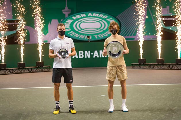 Rotterdam, The Netherlands,7 march 2021, ABNAMRO World Tennis Tournament, Ahoy, Final: Finalist Andrey Rublev (RUS) (L) and runner up Marton Fucsovics (R) receive price. Photo: .tennisimages.com  Copyright: xHenkxKosterx