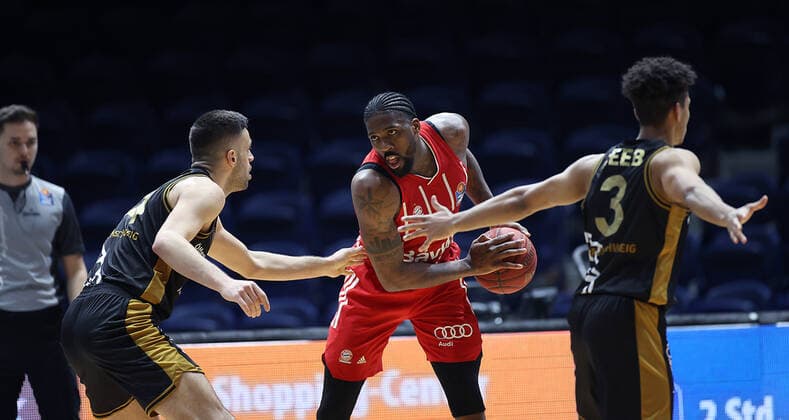 Benedikt Turudic (Basketball Loewen Braunschweig), Jalen Reynolds (FC Bayern Muenchen), Garai Zeeb (Basketball Loewen Braunschweig)
