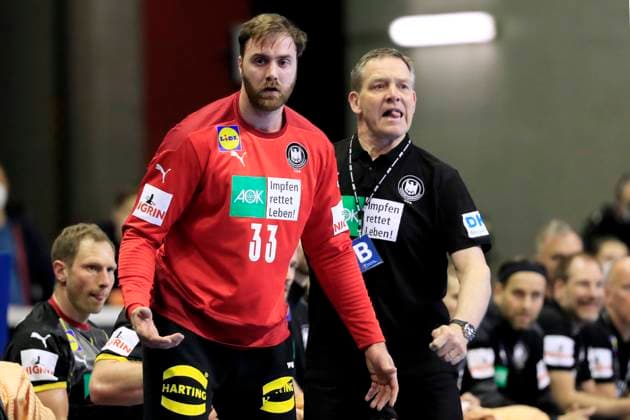 WOLFF Andreas Torwart Team Handball Deutschland Mit Trainer GISLASON Alfred Handball Olympia Qualifikation in Berlin Spiel Deutschland - Slovenien Am 13.03.2021 in der Max Schmeling Halle in Berlin