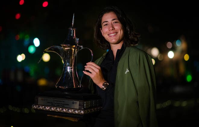 March 13, 2021, DUBAI, UNITED ARAB EMIRATES: Garbine Muguruza of Spain poses with the trophy after winning the 2021 Dubai Duty Free Tennis Championships WTA, Tennis Damen 1000 tournament DUBAI UNITED ARAB EMIRATES - ZUMAa181 20210313_zaa_a181_355 Copyright: xRobxPrangex