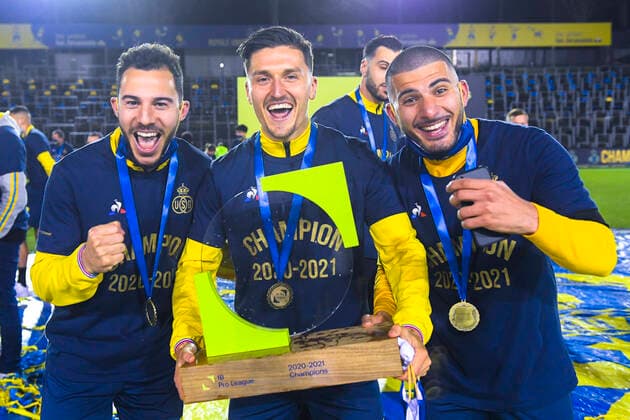 Union s Edisson Jordanov, Union s Marcel Mehlem and Union s Deniz Undav celebrate after winning a soccer match between Royale Union Saint-Gilloise and RWDM, Saturday 13 March 2021 in Brussels, on day 23 of the Proximus League 1B second division of the Belgian soccer championship. LAURIExDIEFFEMBACQ  x05982209x