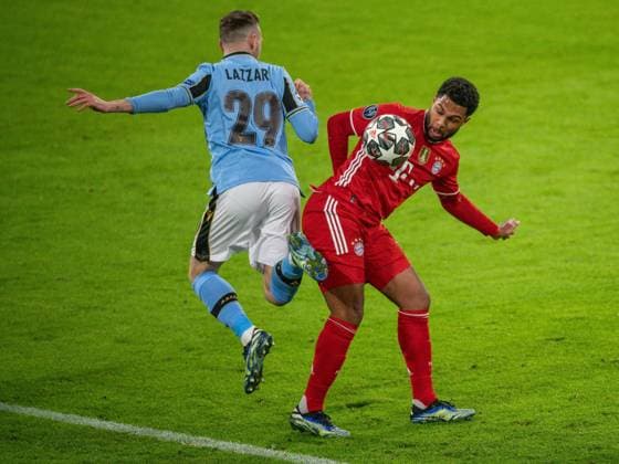 Manuel Lazzari (Lazio Rom, 29), Serge Gnabry (FC Bayern Muenchen, 07), GER, FC Bayern Muechen vs. Lazio Rom, Fussball, Champions League, Achtelfinale, Rueckspiel, Saison 2020 2021, 17.03.2021, DFB DFL regulations prohibit any use of photographs as image sequences and or quasi-video., GER, FC Bayern Muechen vs. Lazio Rom, Fussball, Champions League, Achtelfinale, Rueckspiel, Saison 2020 2021, 17.03.2021 Muenchen Copyright: xEIBNER SaschaxWaltherx EP_EER