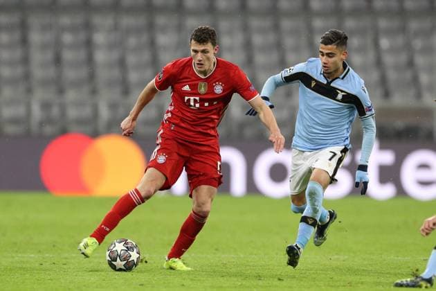 l-r: im Zweikampf, Aktion, mit Benjamin Pavard 5 (FC Bayern Muenchen) und Andreas Pereira 7 (Lazio Rom), FC Bayern Muenchen vs. Lazio Rom, Champions League, Achtelfinale, 17.03.2021 Muenchen Bayern Deutschland