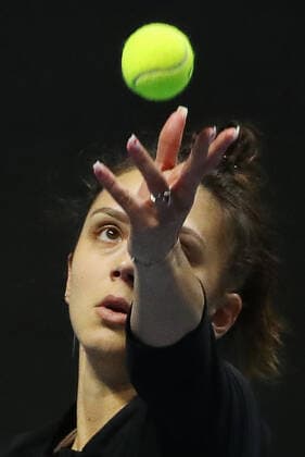 ST PETERSBURG, RUSSIA â€“ MARCH 19, 2021: Romaniaâ€™s Jaqueline Cristian serves in a 2021 WTA, Tennis Damen Premier St Petersburg Ladies Trophy quarterfinal singles match against Russiaâ€™s Kuznetsova at Sibur Arena. Alexander Demianchuk TASS  TS0F9E64