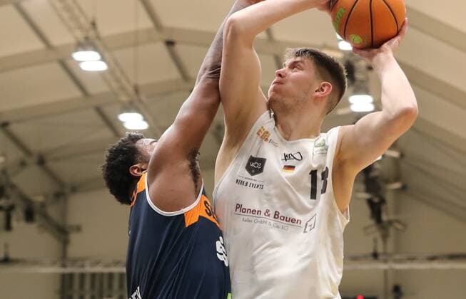 20.03.2021 - Basketball - Saison 2019 2020 - 2. Bundesliga Pro-A - 27. Spieltag: Nürnberg Falcons Basketball Club NBC - Rostock Seawolves - DaMa - Trevor Lacey (7, Rostock Seawolves ) Jonathan Maier (13, Nürnberg Falcons BC NBC )