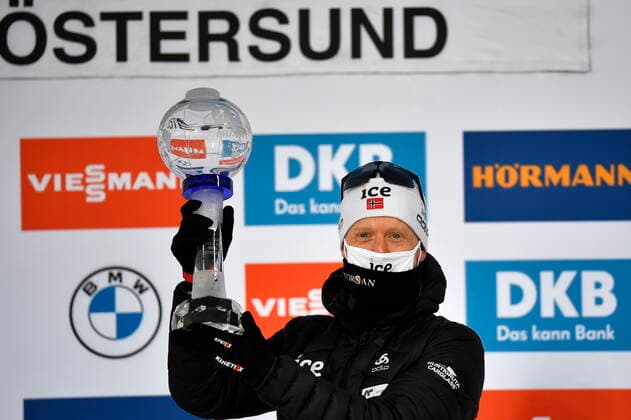 Third placed Johannes Thingnes Boe of Norway celebrates with the trophy after winning the total World Cup, after the Men s 15km Mass Start Competition during the IBU World Cup Biathlon event in Ostersund, Sweden, on March 21, 2021. Photo Anders Wiklund TT code 10040