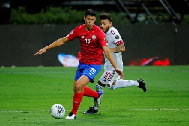 GUADALAJARA (MEXICO), 03 21 2021.- Alexis Gamboa (l) from Costa Rica disputes the ball with Alexis Vega (r) from Mexico during a match of the CONCACAF Men s Olympic Qualifying tournament for soccer, at Akron Stadium, in Guadalajara, Jalisco, Mexico, 21 March 2021. EFE Francisco Guasco Costa Rica - Mexico !ACHTUNG: NUR REDAKTIONELLE NUTZUNG!  Copyright: xFranciscoxGuascox AME4421 20210322-637519816441948821