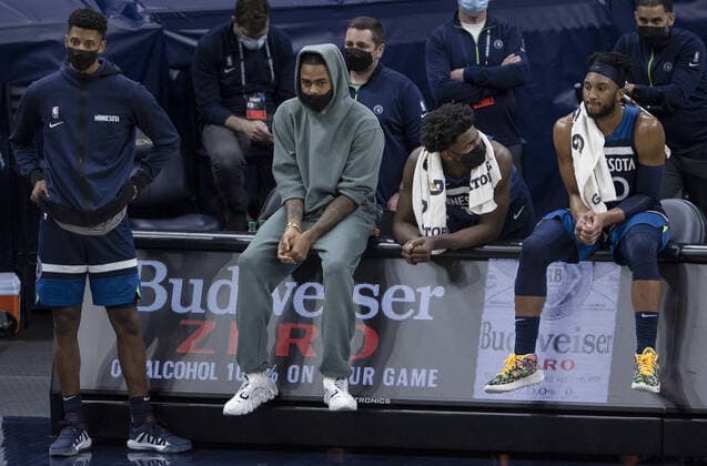 March 22, 2021, Minneapolis, MN, United States: Jarrett Culver, D Angelo Russell, Anthony Edwards and Josh Okogie watch from the Minnesota Timberwolves bench in the final minute of the game on March 22, 2021 at the Target Center in Minneapolis. Minneapolis United States - ZUMAm67_ 0115791858st Copyright: xCarlosxGonzalezx