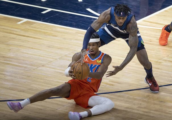 March 22, 2021, Minneapolis, MN, United States: Shai Gilgeous Alexander (2) of the Oklahoma City Thunder and Jarred Vanderbilt (8) of the Minnesota Timberwolves fight for the ball in the first quarter on March 22, 2021 at the Target Center in Minneapolis. Minneapolis United States - ZUMAm67_ 0115791999st Copyright: xCarlosxGonzalezx