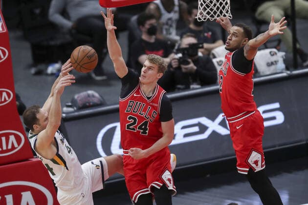 March 22, 2021: Chicago Bulls forward Lauri Markkanen (24) and Chicago Bulls center Daniel Gafford (12) guard Utah Jazz forward Bojan Bogdanovic (44) during the fourth period at the United Center Monday March 22, 2021 in Chicago. - ZUMAm67_ 0115792536st Copyright: xArmandoxL.xSanchezx