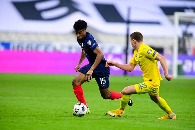 Kingsley Coman (France)vs Mykola Matviyenko (Ukraine) FOOTBALL : France vs Ukraine - Eliminatoires coupe du Monde 2022 - 24 03 2021 JBAutissier Panoramic 