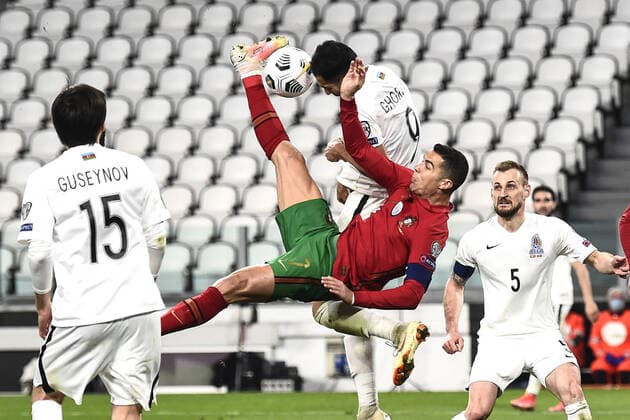 Sport Themen der Woche KW12 Sport Bilder des Tages Torino 24 03 2021 - qualificazioni Mondiali Qatar 2022 Portogallo-Azerbaijan foto Nicolo Campo Image nella foto: Cristiano Ronaldo-Ali Ghorbani 