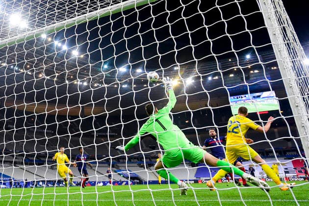 GIROUD OLIVIER (France) vs Georgiy Bushchan (Ukraine) FOOTBALL : France vs Ukraine - Eliminatoires coupe du Monde 2022 - 24 03 2021 JBAutissier Panoramic 