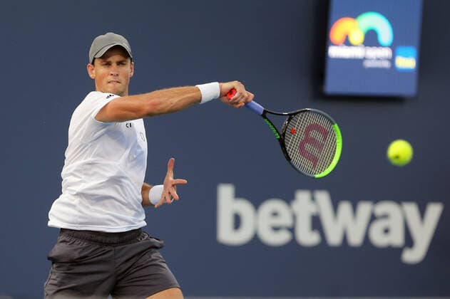 March 24, 2021, Miami Gardens, Florida, United States Of America: MIAMI GARDENS, FL - MARCH 24: Vasek Pospisil seen playing on day 3 of the Miami Open on March 24, 2021 at Hard Rock Stadium in Miami Gardens, Florida...People: Vasek Pospisil Miami Gardens United States Of America - ZUMAs214 20210324_zda_s214_026 Copyright: xSMGx