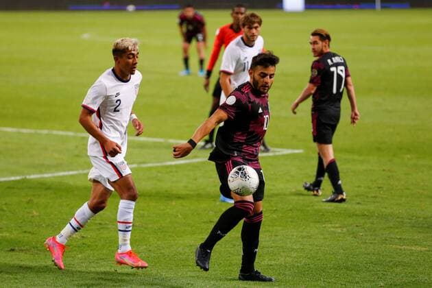 Alexis Vega (R) of Mexico disputes the ball with Julian Araujo (L) of United States during the CONCACAF Men s Olympic Qualification tournament at Jalisco Stadium, in Guadalajara, Mexico, 24 March 2021. Mexico vs. USA CONCACAF Men s Olympic Qualification tournament !ACHTUNG: NUR REDAKTIONELLE NUTZUNG!  Copyright: xFranciscoxGuascox AME5455 20210325-637522457929135901