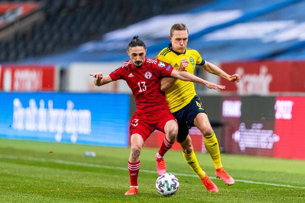 210325 Grigol Chabradze of Georgia and Ludwig Augustinsson of Sweden during the FIFA World Cup, WM, Weltmeisterschaft, Fussball Qualifier football match between Sweden and Georgia on March 25, 2021 in Stockholm. Photo: Jesper Zerman BILDBYRAN COP 234 JM0097 bbeng fotboll football soccer fotball vm-kval kval fifa world cup qualifier qualifier landskamp sverige sweden sverige a georgia georgien *** 210325 Grigol Chabradze of Georgia and Ludwig Augustinsson of Sweden during the FIFA World Cup Qualifier football match between Sweden and Georgia on March 25, 2021 in Stockholm Photo Jesper Zerman BILDBYRAN COP 234 JM0097 bbeng fotboll football soccer fotball vm kval kval fifa world cup qualifier qualifier landskamp sweden sweden sverige a georgia georgien,  Copyright: JESPERxZERMAN BB210325JZ027